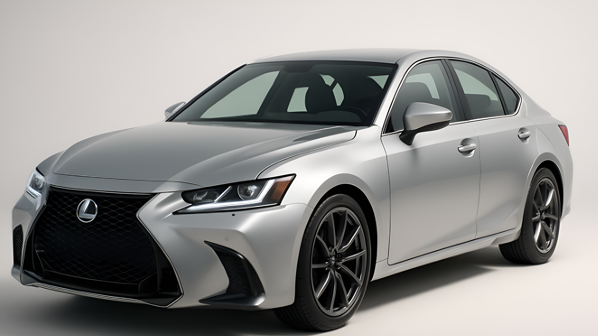 High-resolution studio photograph of a sleek silver luxury sedan with a glossy