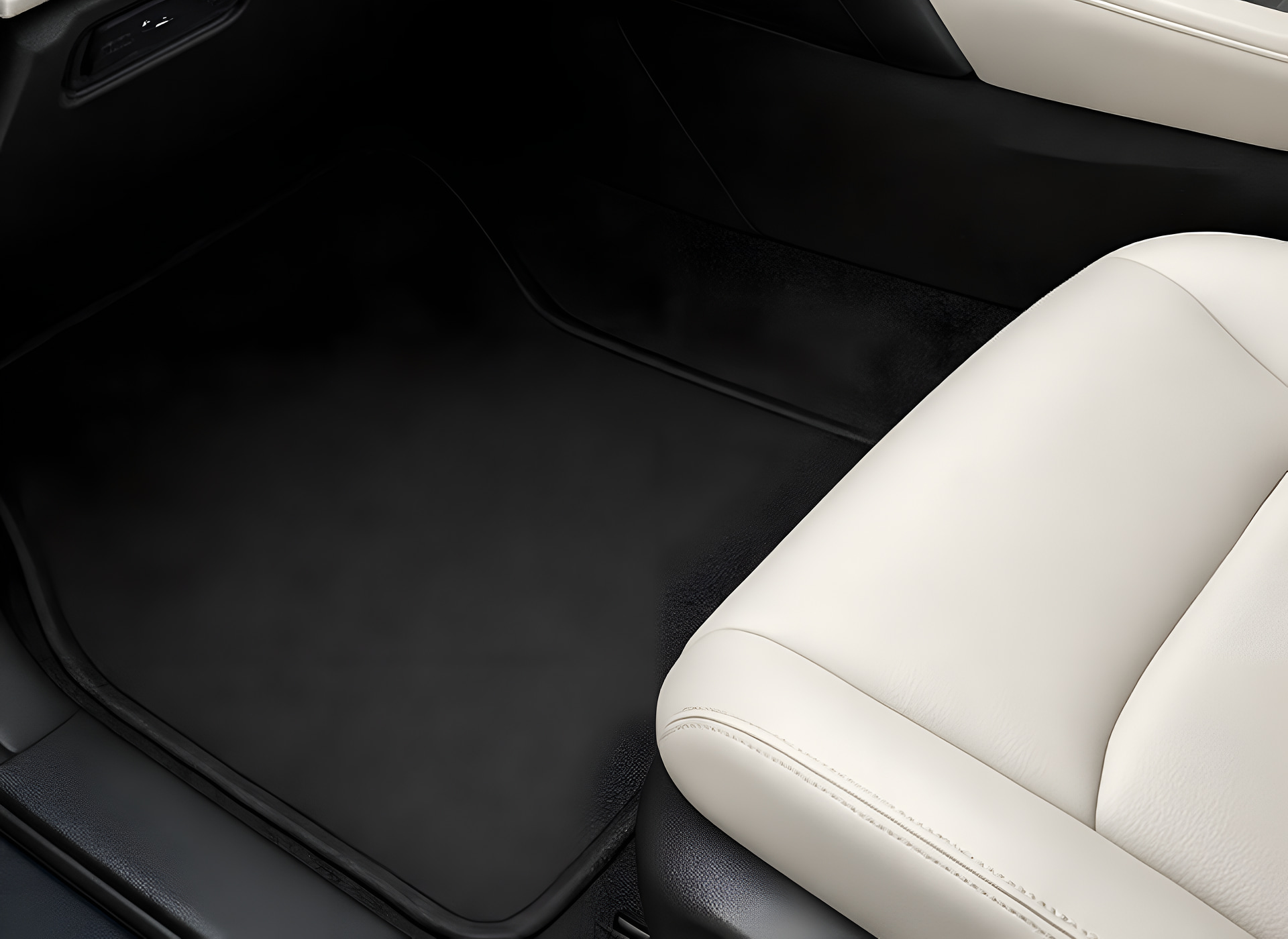 Clean car interior with white leather seats and dark gray floor mats