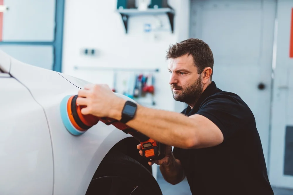 professional removing dent from car